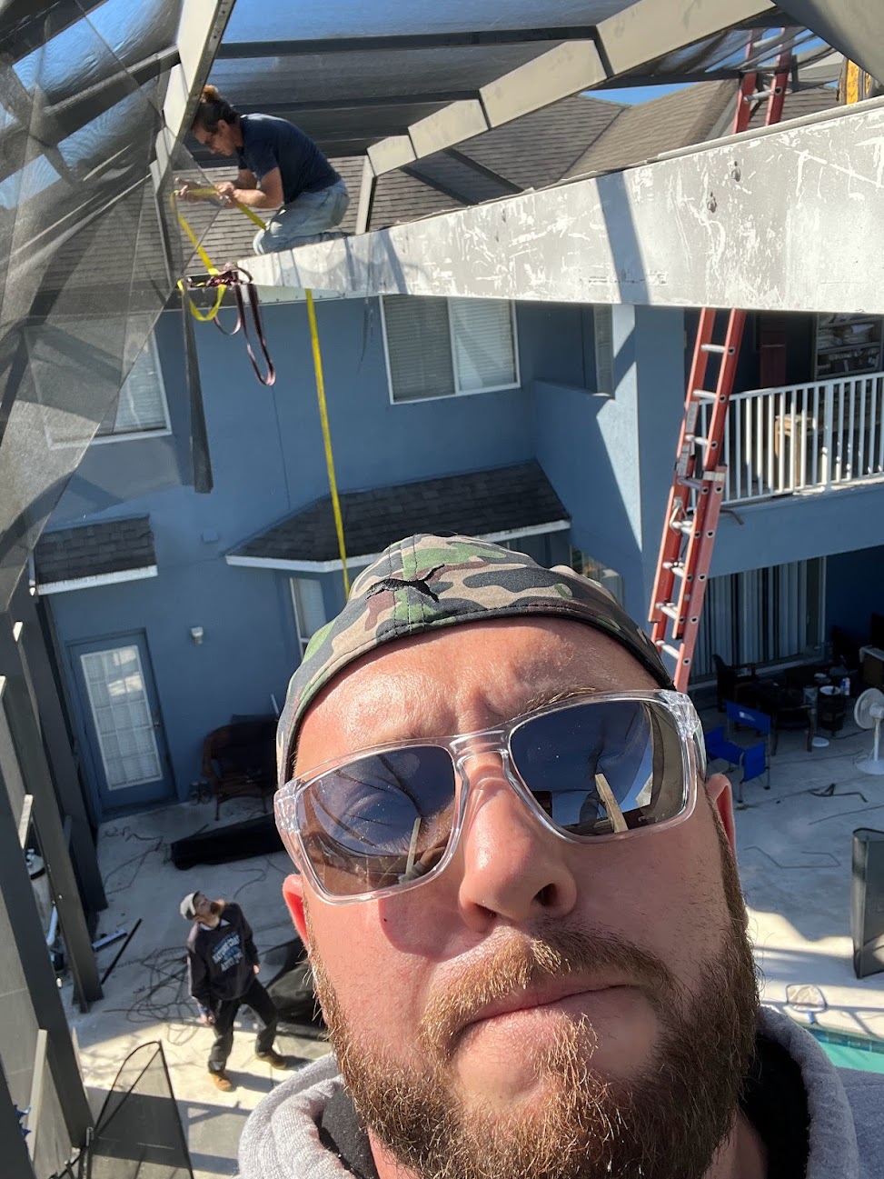 Gian Nicolo, Owner & Founder of Screening Dunrite — on a two-story pool cage job